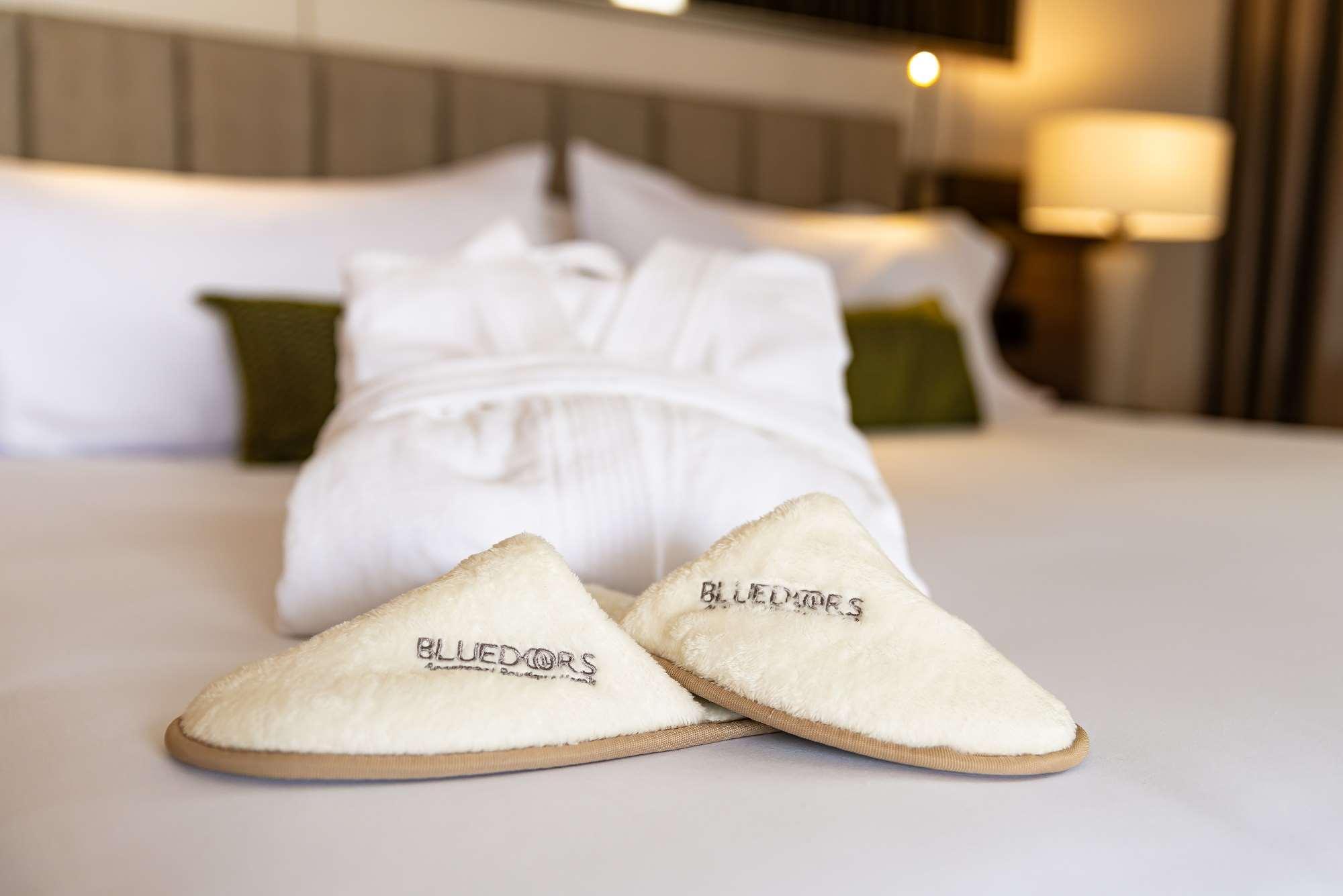 Hotel York Luxury Suites Medellin By Preferred Extérieur photo A pair of hotel slippers