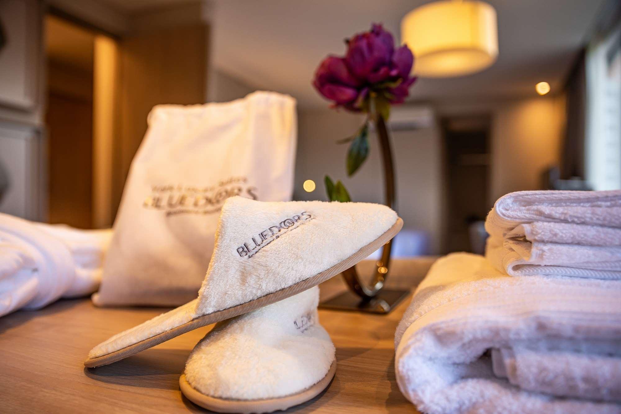 Hotel York Luxury Suites Medellin By Preferred Extérieur photo A pair of hotel slippers